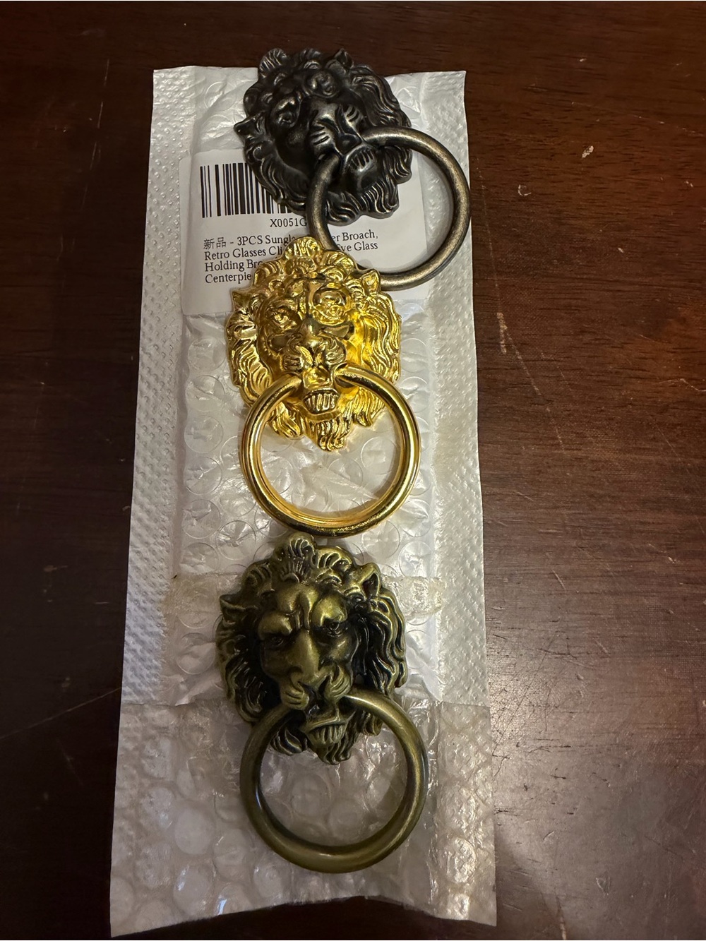 Decorative Lion Head Ring broaches - Gold and Antique Brass - Unbranded